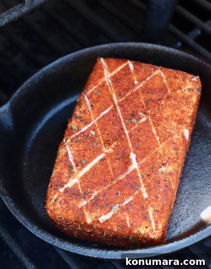 Smoked Cream Cheese Recipe and Serving Ideas 6 seasoned block of cream cheese in cast iron skillet