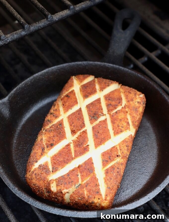 Smoked Cream Cheese Recipe and Serving Ideas 7 smoked cream cheese in cast iron skillet on smoker