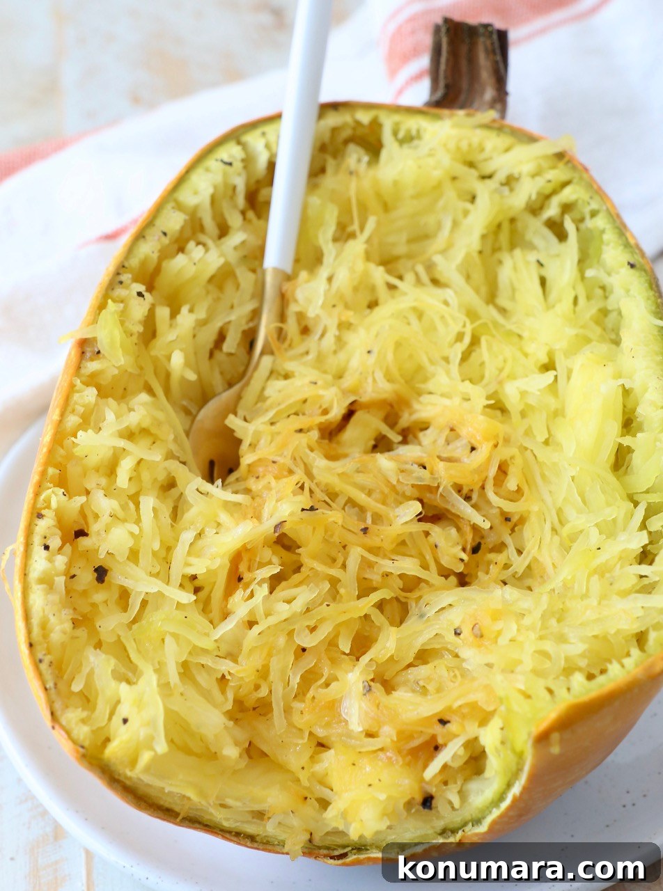 roasted spaghetti squash on plate with fork