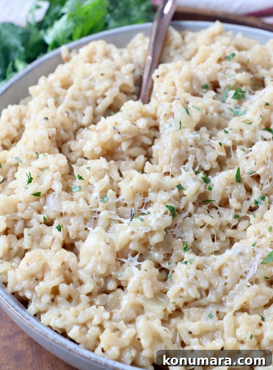 Creamy Instant Pot Risotto Recipe 2 parmesan risotto in bowl with fork