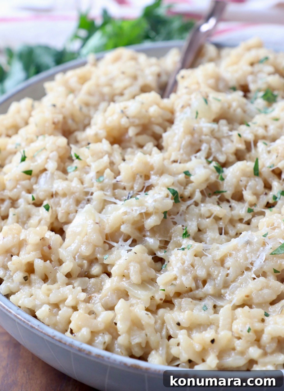 Creamy Instant Pot Risotto Recipe 11 parmesan risotto in bowl with fork
