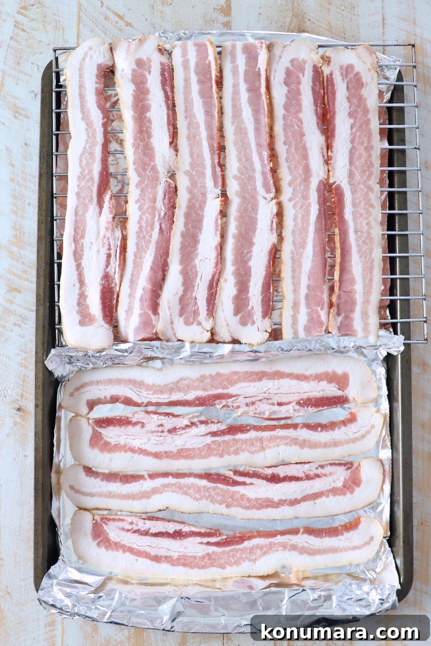 How to Cook Bacon in the Oven for Crispy, Even Results 3 uncooked bacon on baking sheet