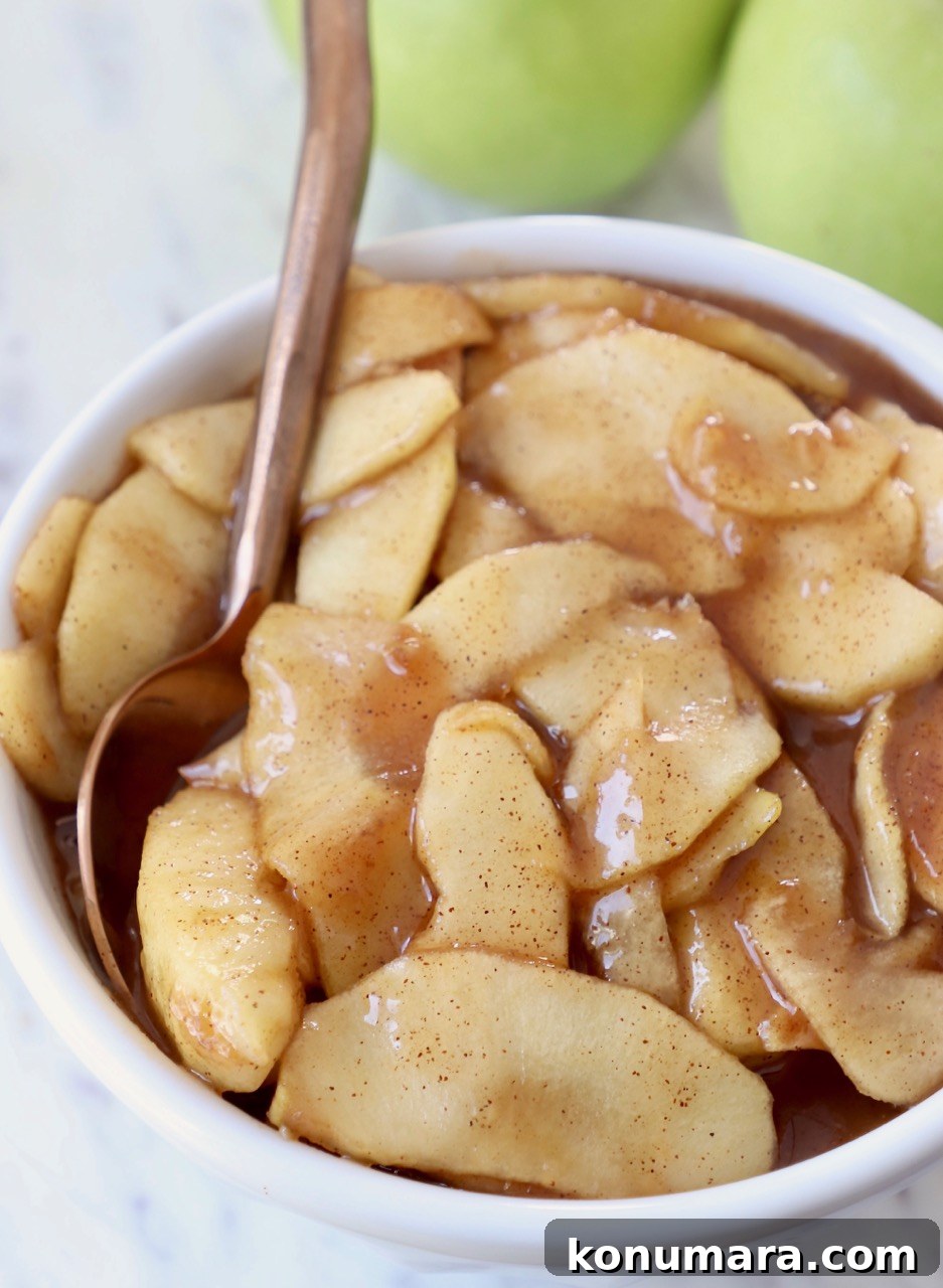 apple pie filling in bowl with spoon