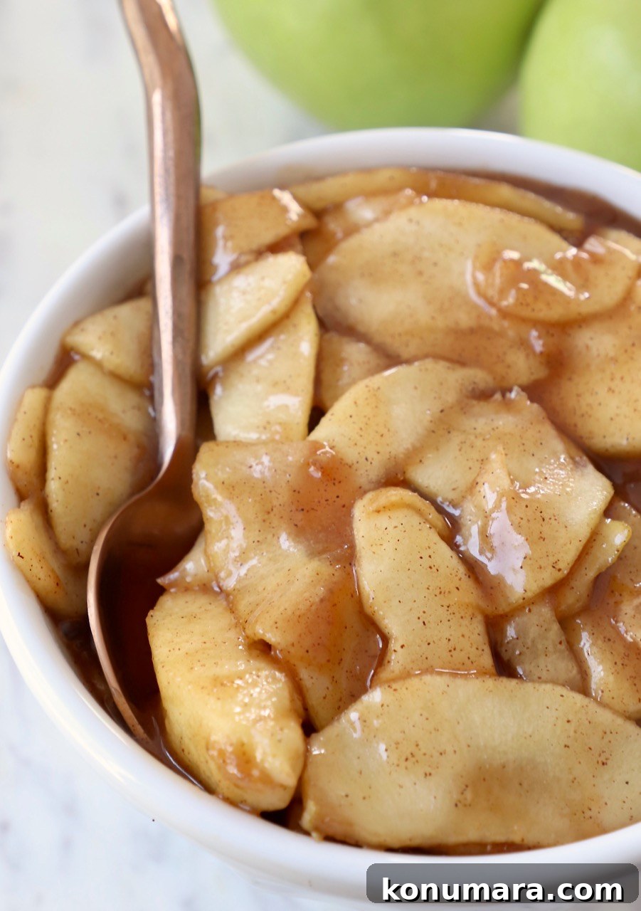 apple pie filling in bowl with spoon