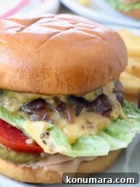 animal style burger on plate