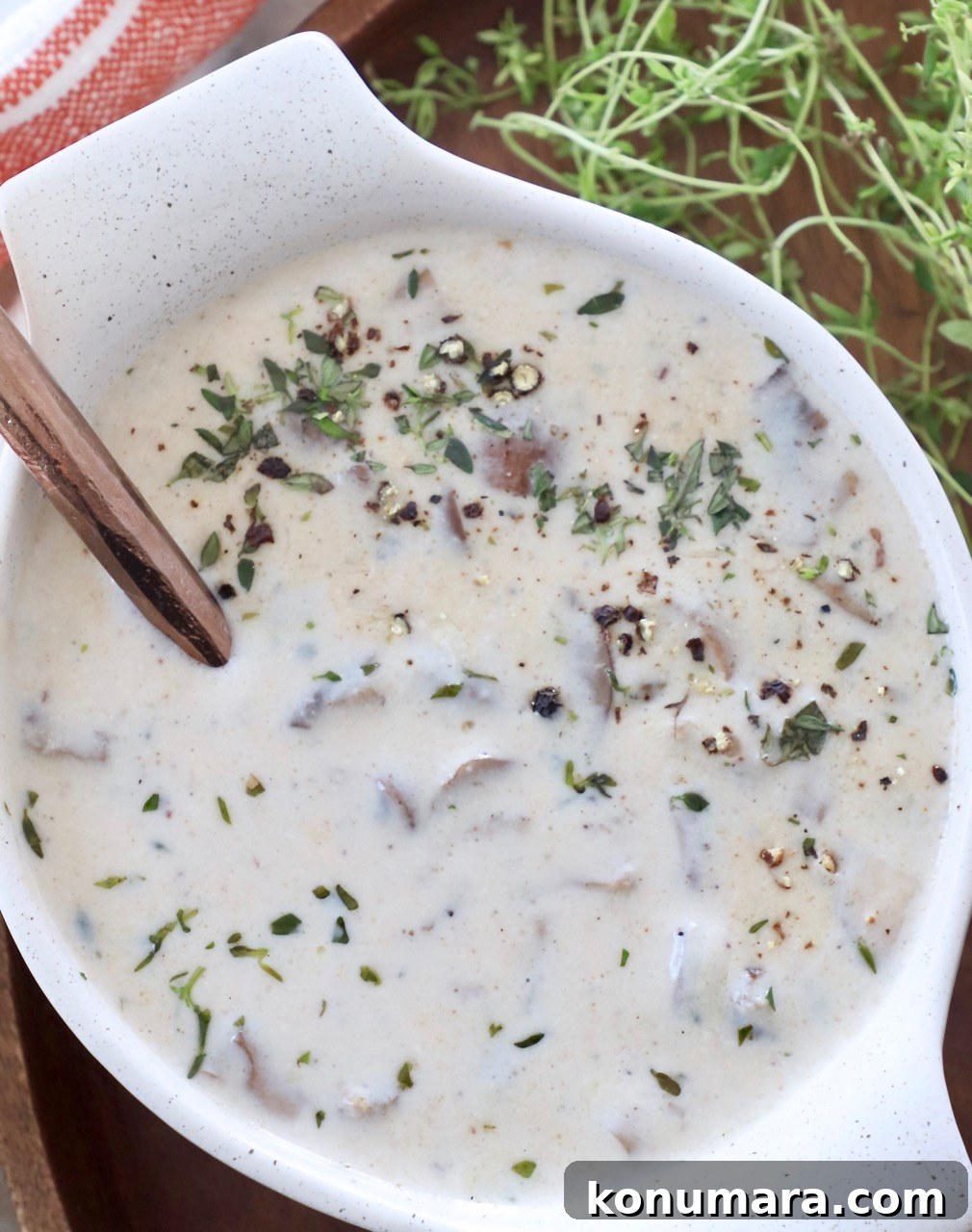 Velvety Cream of Mushroom Soup Recipe 8 cream of mushroom soup in bowl with spoon