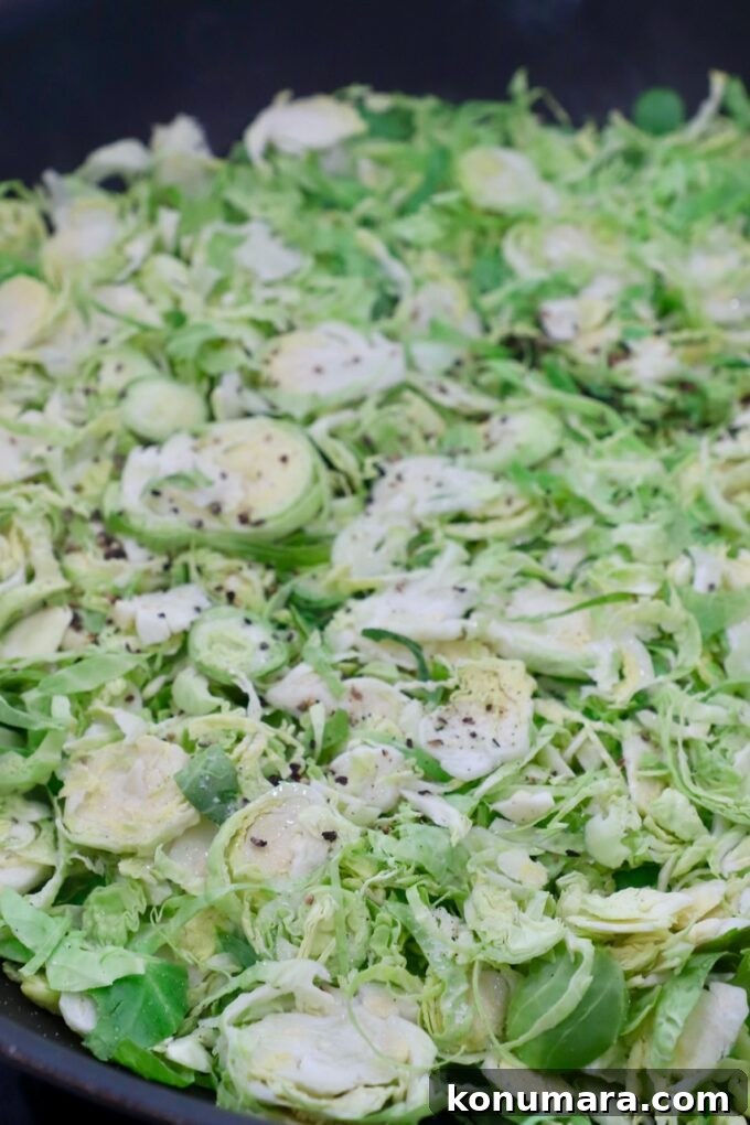Shredded Brussels Sprouts Slaw with Lemon Vinaigrette 4 shredded brussels sprouts in skillet