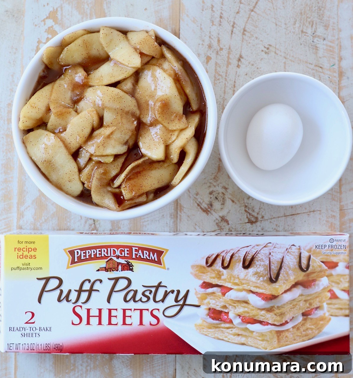 Classic Flaky Apple Danish with Cinnamon Filling 3 apple danish ingredients on wood board