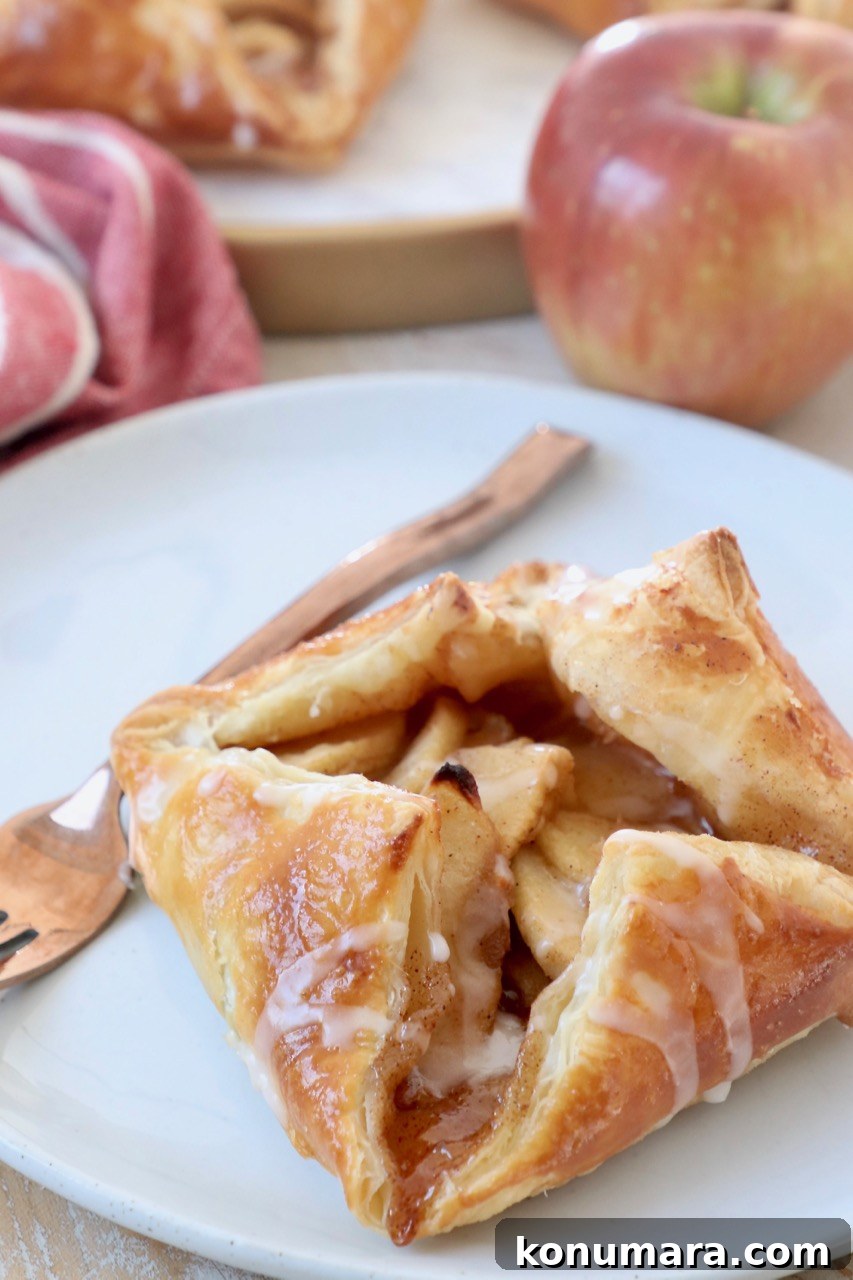 Classic Flaky Apple Danish with Cinnamon Filling 10 apple danish on plate with fork