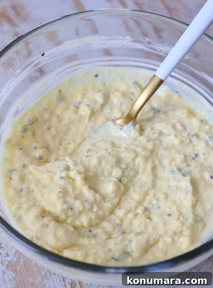 deviled egg filling with relish in glass bowl with fork