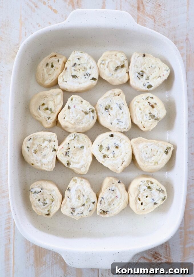 Cheesy Jalapeno Popper Crescent Rolls 11 uncooked jalapeno popper crescent rolls in casserole dish