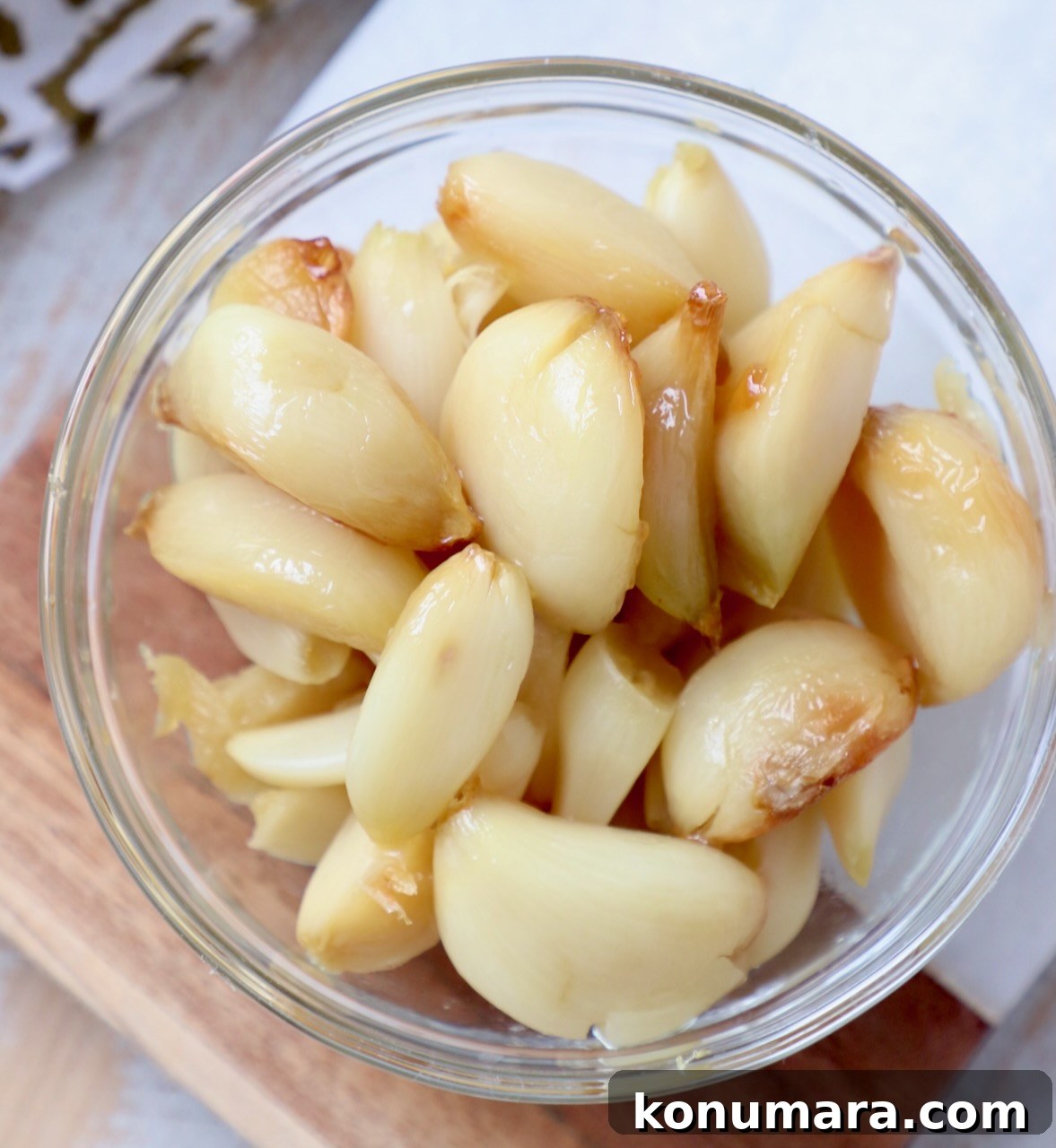roasted garlic cloves in glass bowl