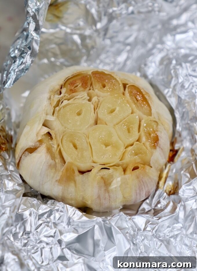 roasted head of garlic wrapped in a piece of foil