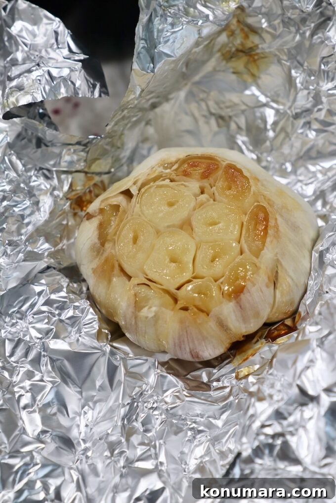 head of roasted garlic in foil