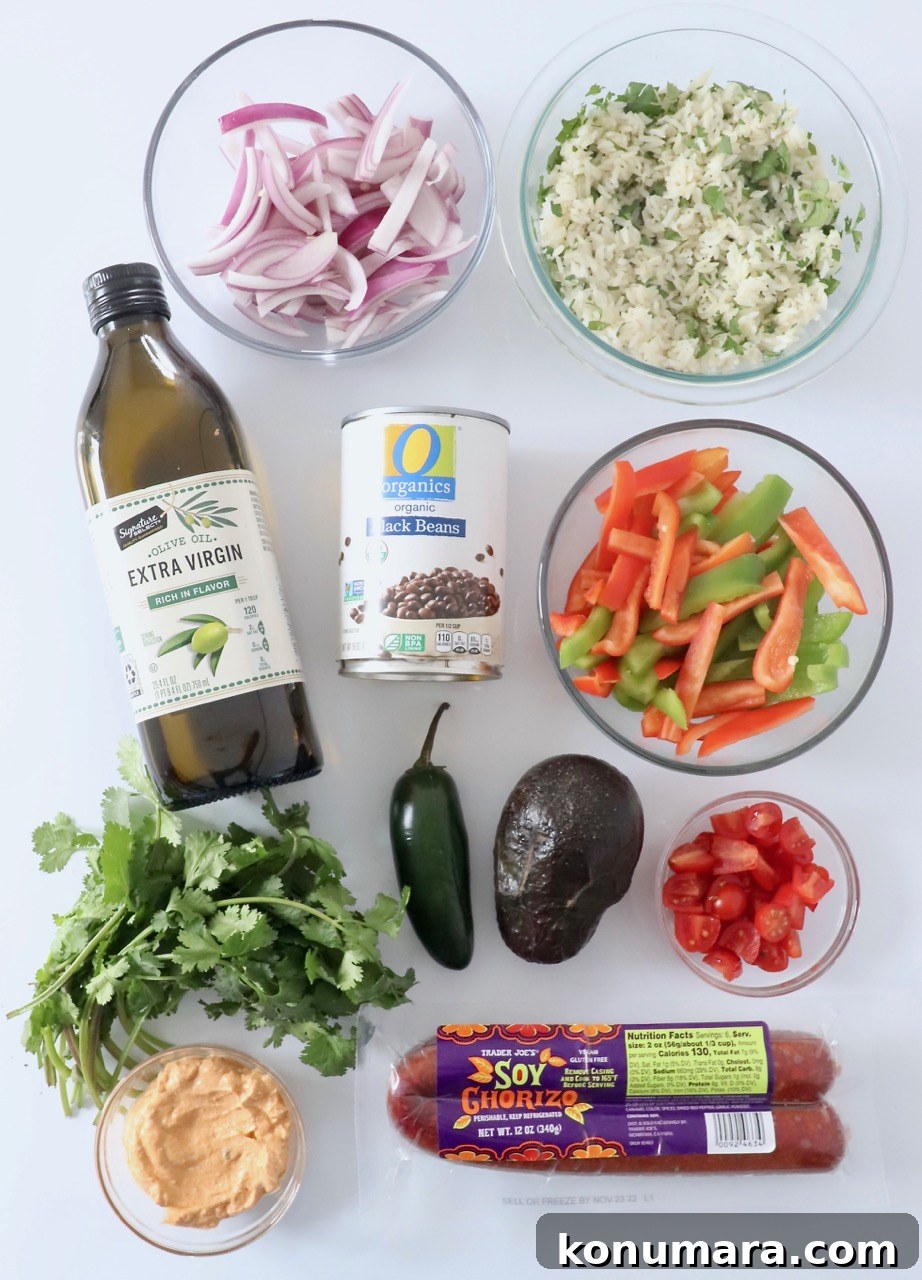 ingredients for vegetarian burrito bowl on white background