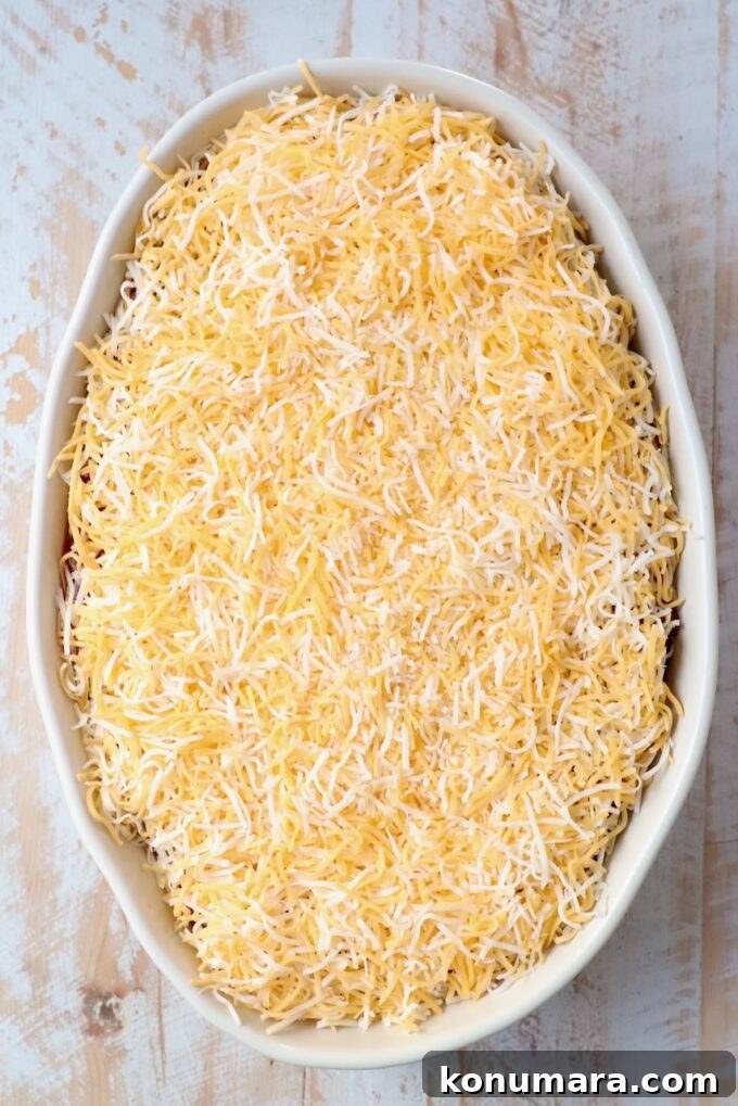 shredded cheese in casserole dish