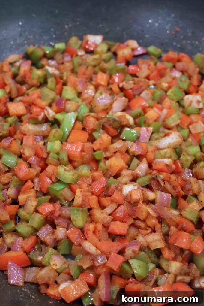 fajita seasoned diced peppers and onions in skillet