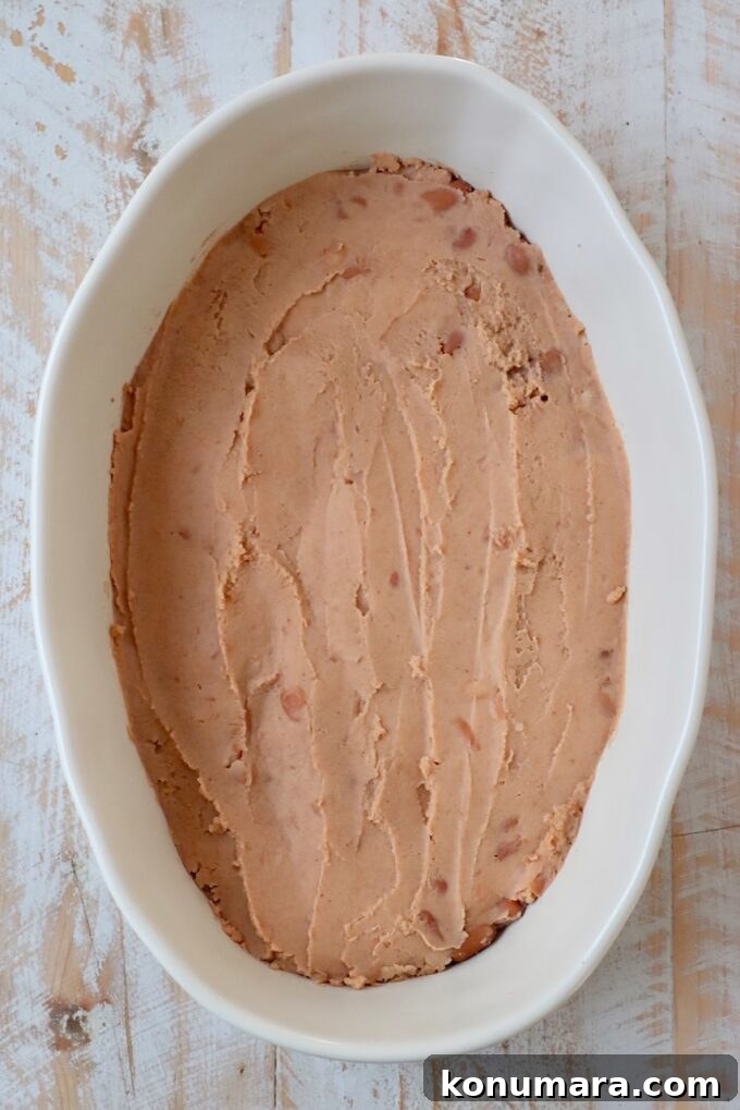 refried beans in casserole dish