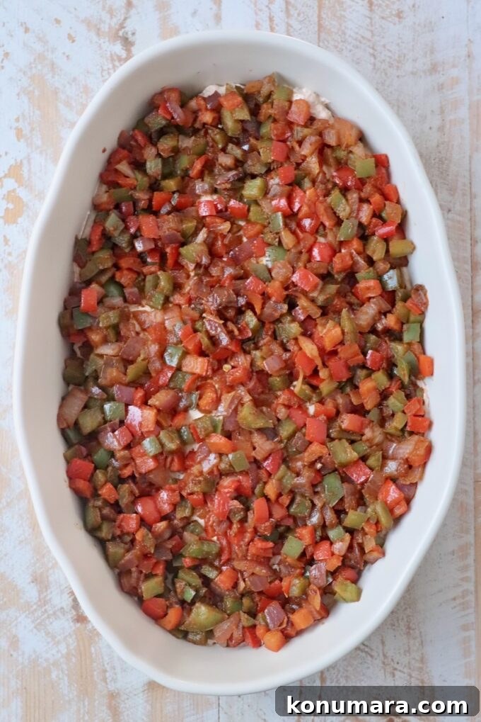diced fajita vegetables in casserole dish
