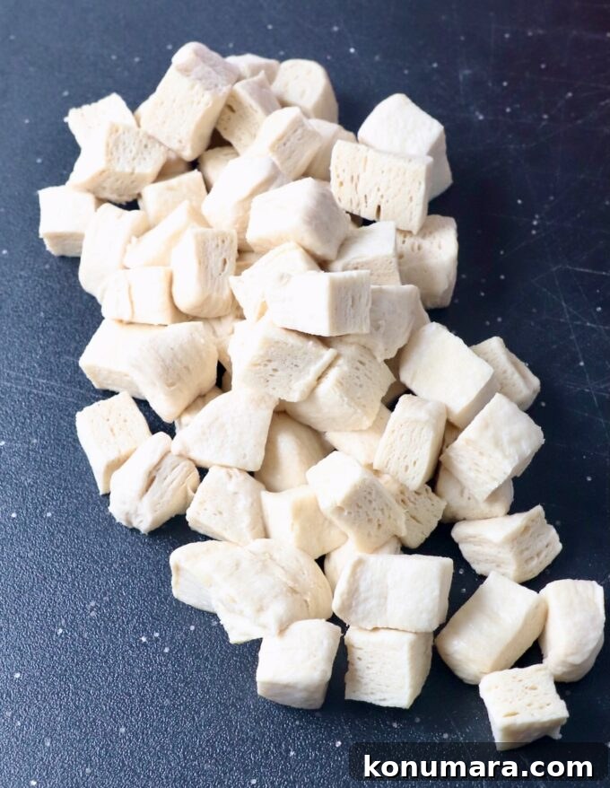diced biscuit dough on cutting board