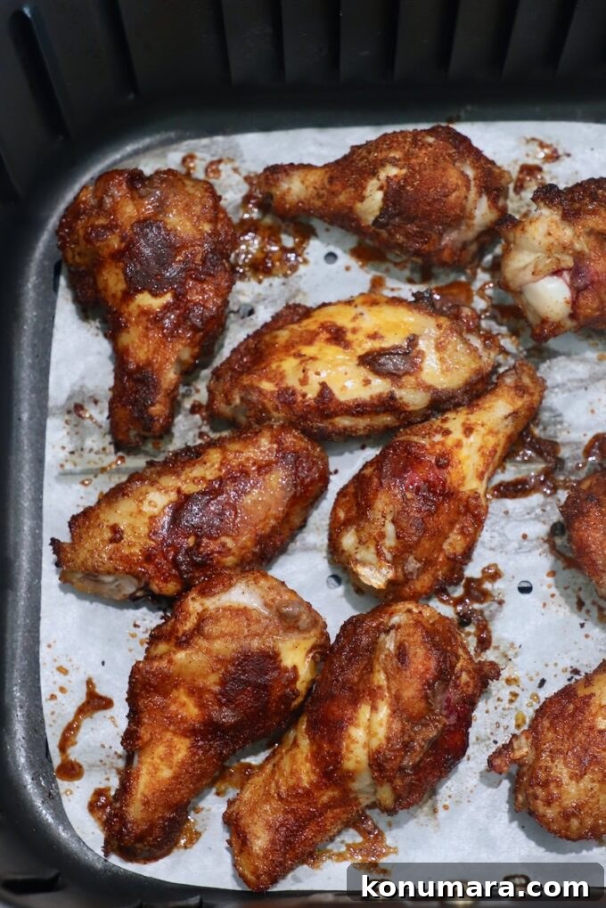 Crispy Air Fryer Chicken Wings Recipe 7 cooked chicken wings in air fryer basket