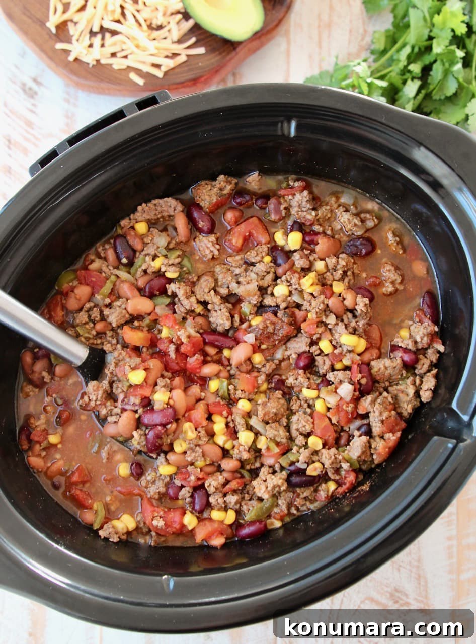 Slow Cooker Taco Soup with Ground Beef and Beans 7 Crockpot taco soup with corn, beans, tomatoes and ground beef