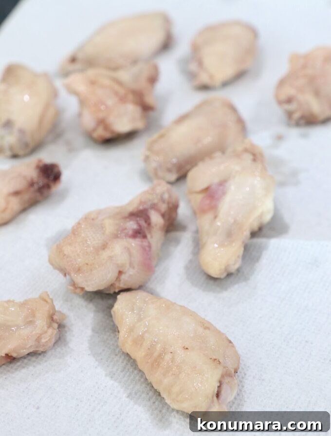 cooked chicken wings on paper towels