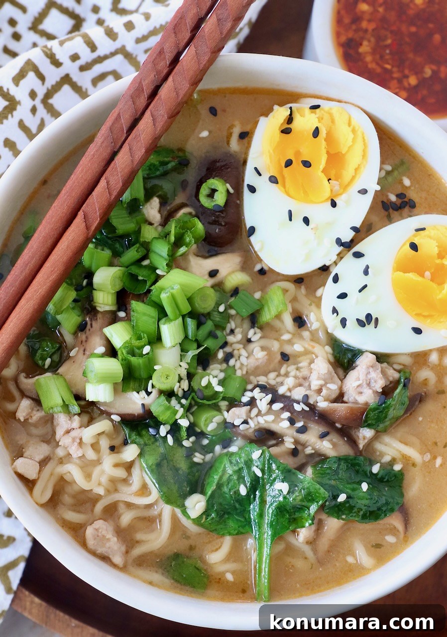 Authentic Miso Ramen Recipe 2 miso ramen in bowl with chopsticks on the side