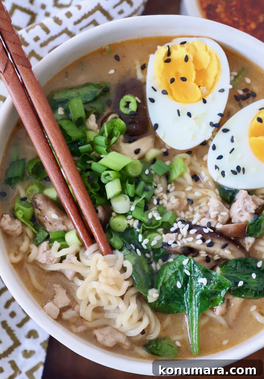 Authentic Miso Ramen Recipe 11 miso ramen in bowl with chopsticks and egg