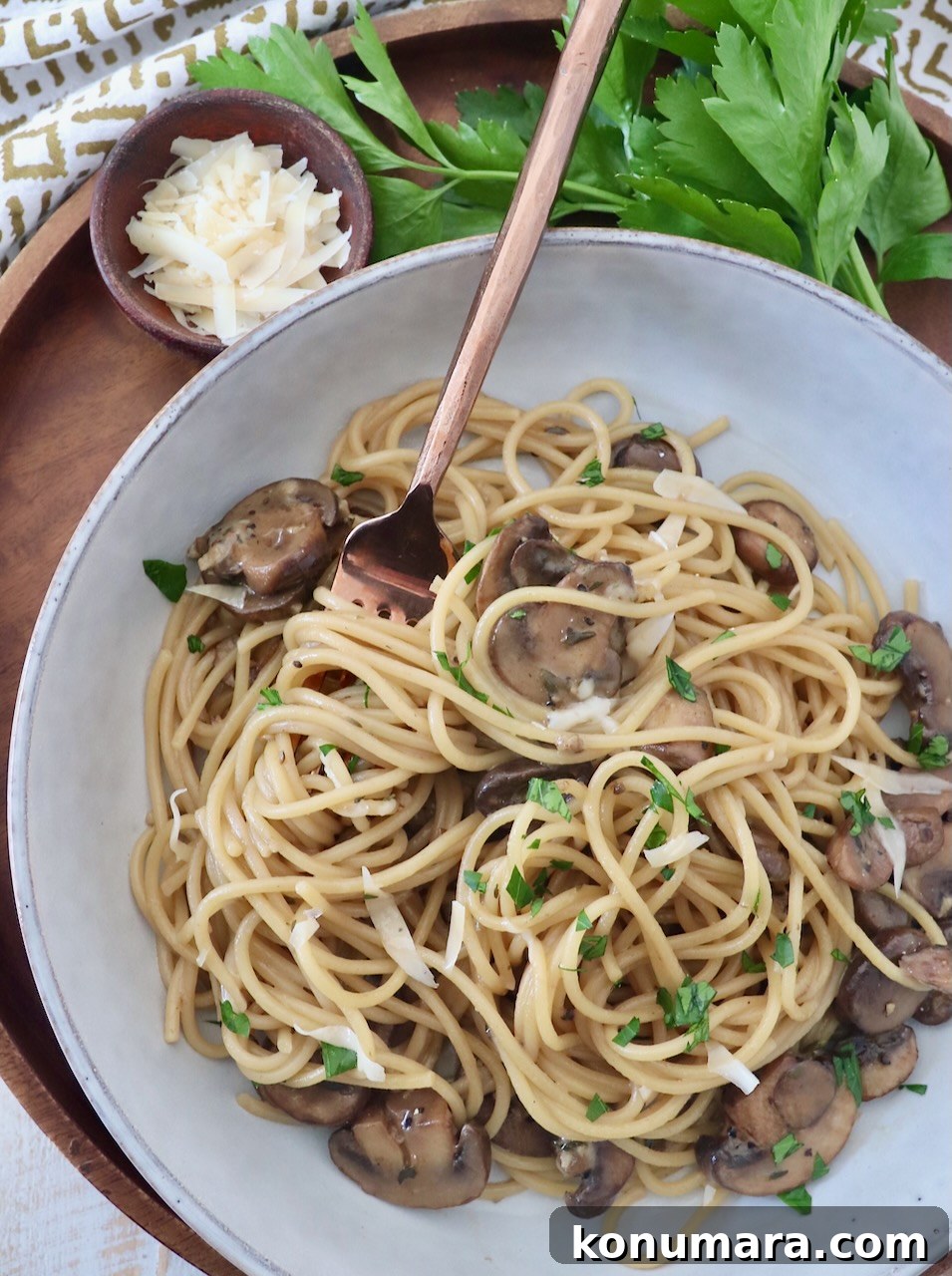 Creamy Garlic Mushroom Pasta Recipe with Parmesan 2 mushroom pasta in bowl with fork