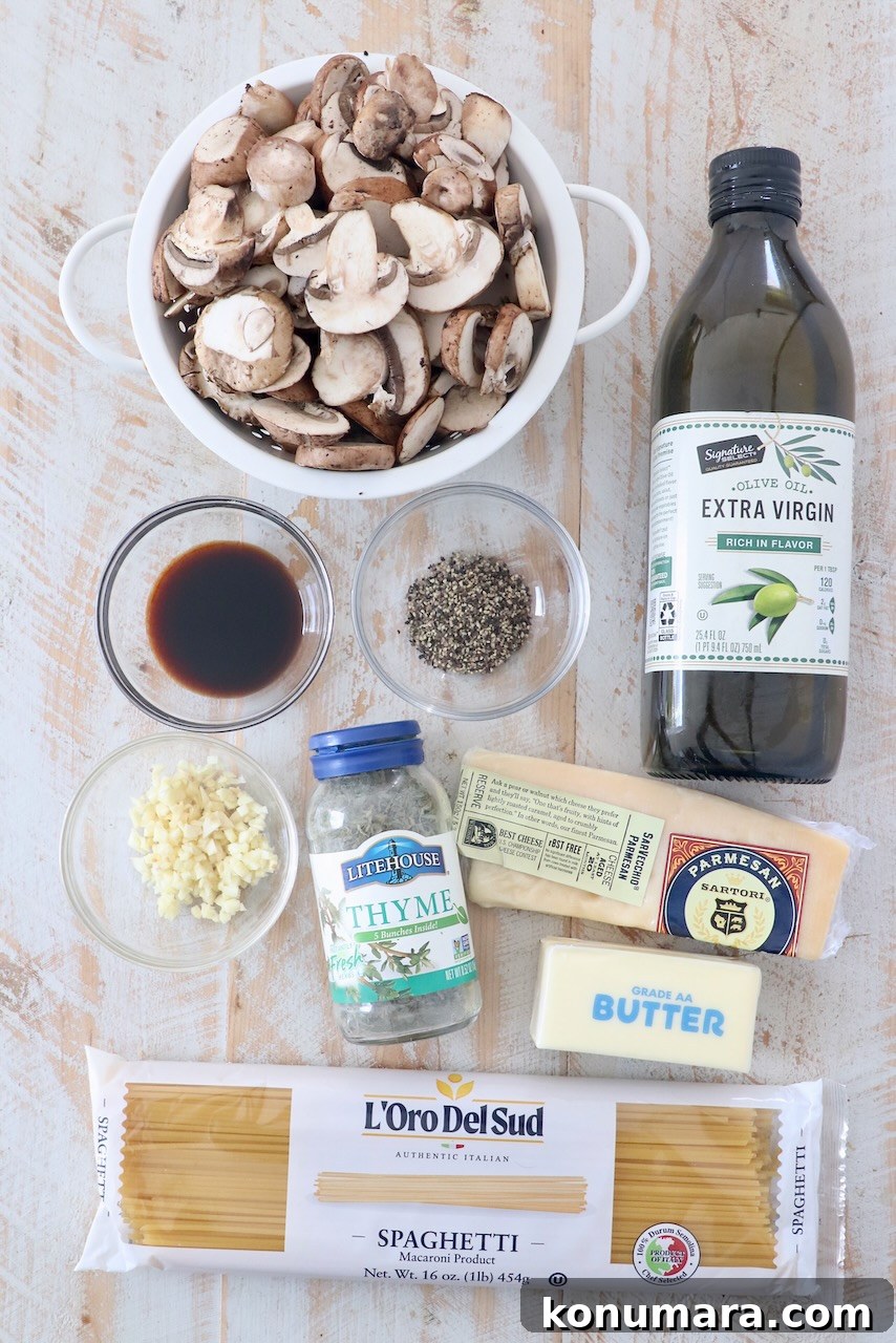Creamy Garlic Mushroom Pasta Recipe with Parmesan 3 ingredients for mushroom pasta on white wood board