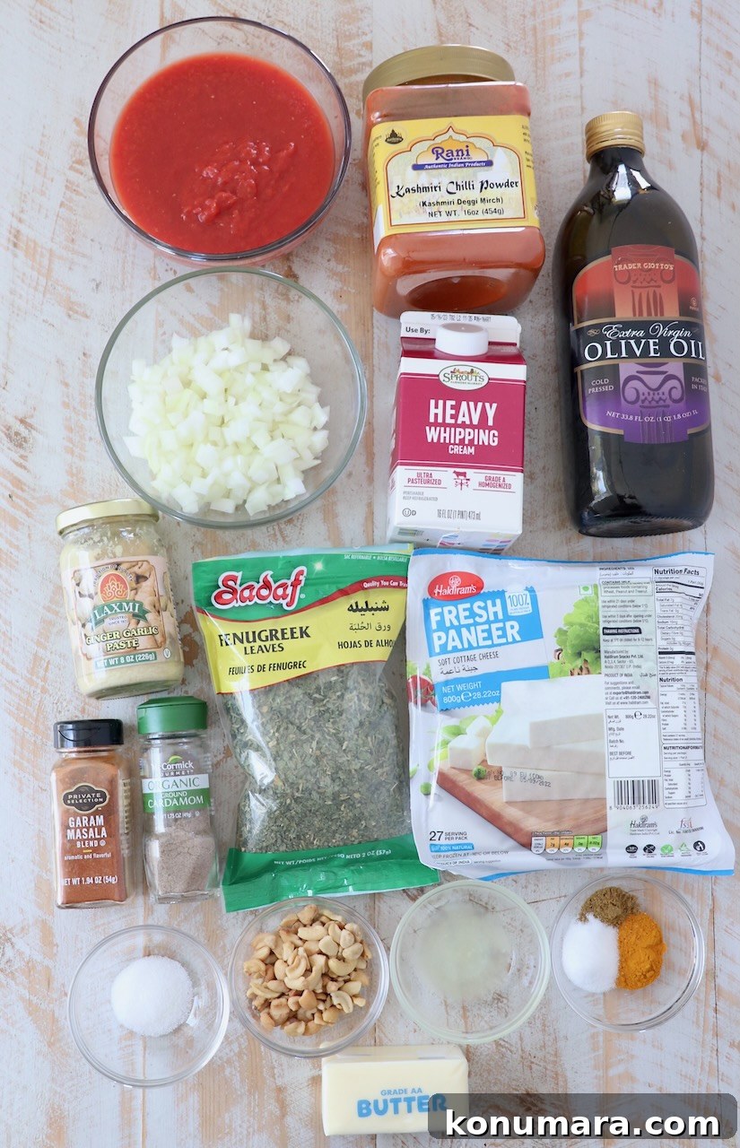Paneer Makhani: Creamy Indian Butter Paneer Recipe 3 ingredients for paneer makhani on white wood board