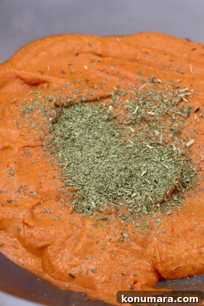 Paneer Makhani: Creamy Indian Butter Paneer Recipe 7 curry sauce with fenugreek leaves in large pan