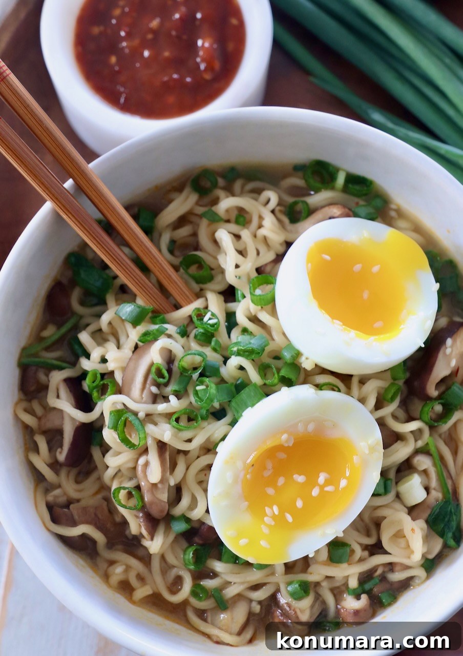 Vegetarian Ramen Recipe: Miso Umami Broth with Vegetables 7 prepared ramen noodle soup in bowl with soft boiled egg and chopsticks