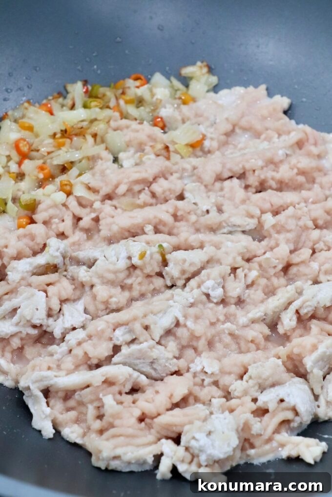 Spicy Thai Basil Chicken (Pad Krapow) Recipe 5 ground chicken with vegetables in large skillet