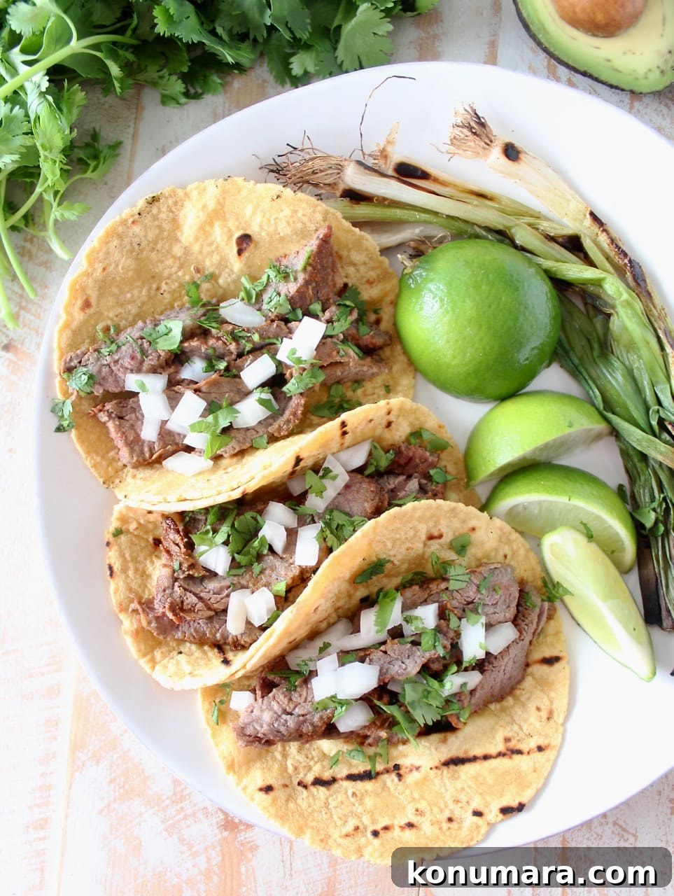 Carne Asada Tacos with Limes, Cilantro and Onions