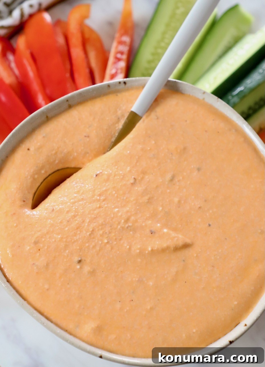 Spicy Whipped Feta Dip with Chili Oil and Herbs 6 spicy feta dip in bowl with spoon