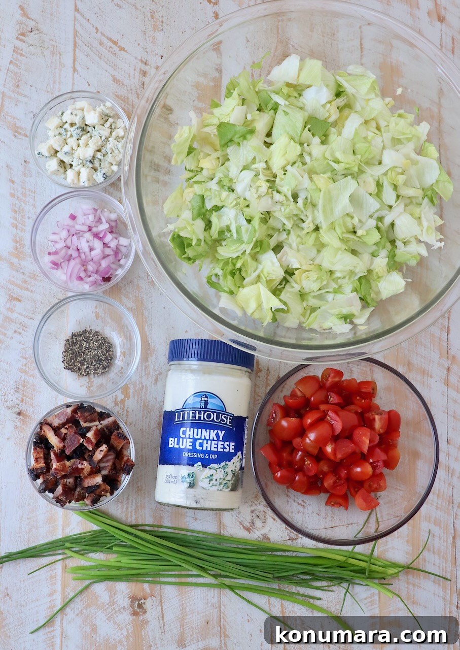 Creamy Blue Cheese Salad Recipe with Tangy Dressing 3 blue cheese salad ingredients on white wood board