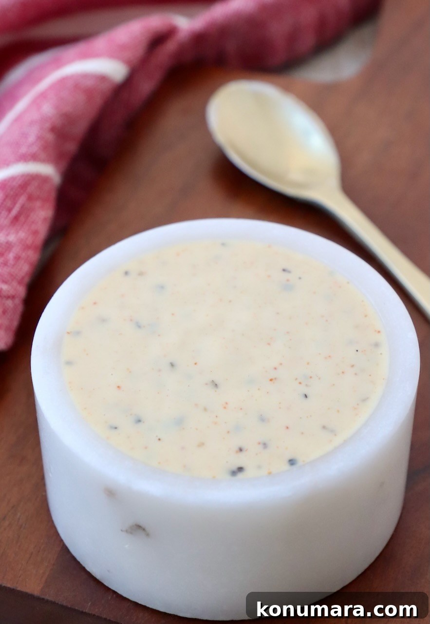 Creamy Alabama White BBQ Sauce Recipe 4 white bbq sauce in small white bowl
