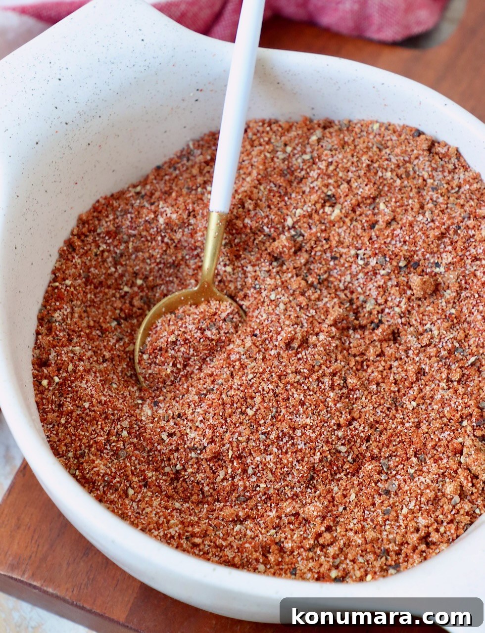 bbq seasoning blend in bowl with small spoon