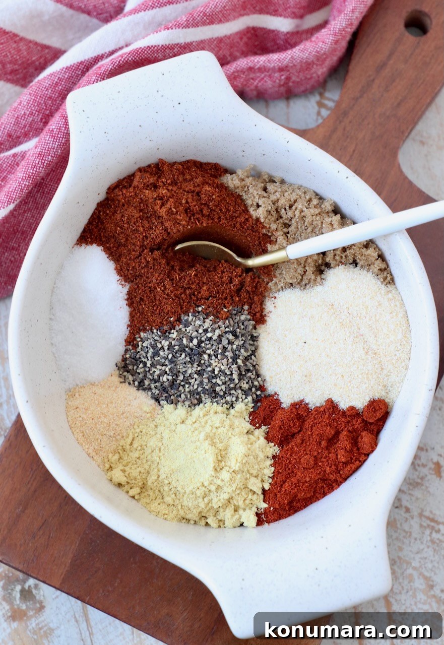 spices separated in bowl with spoon