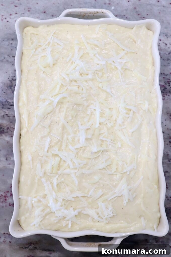 assembled, uncooked pastitsio in casserole dish