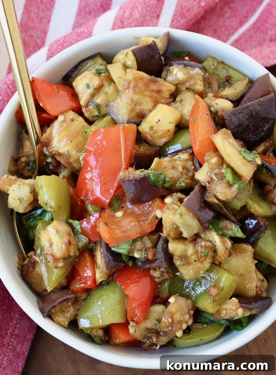 Smoky Grilled Eggplant Salad with Lemon and Herbs 6 marinated eggplant salad in bowl with spoon