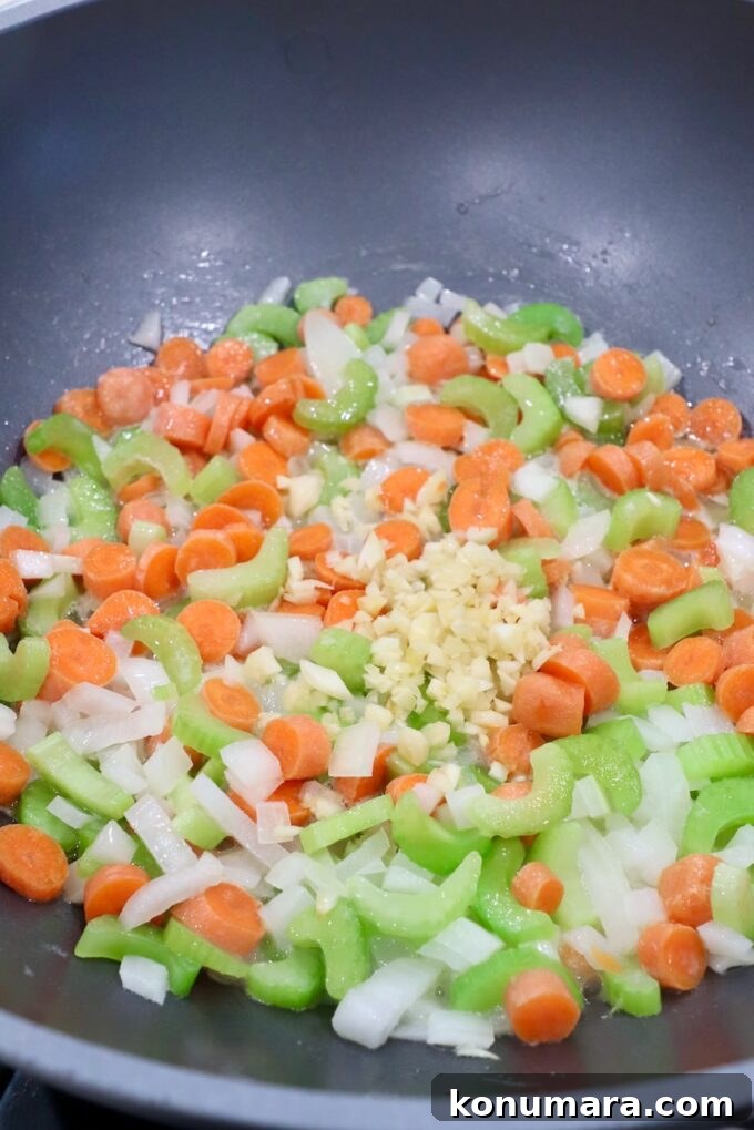 diced carrots, onions, celery and garlic in skillet