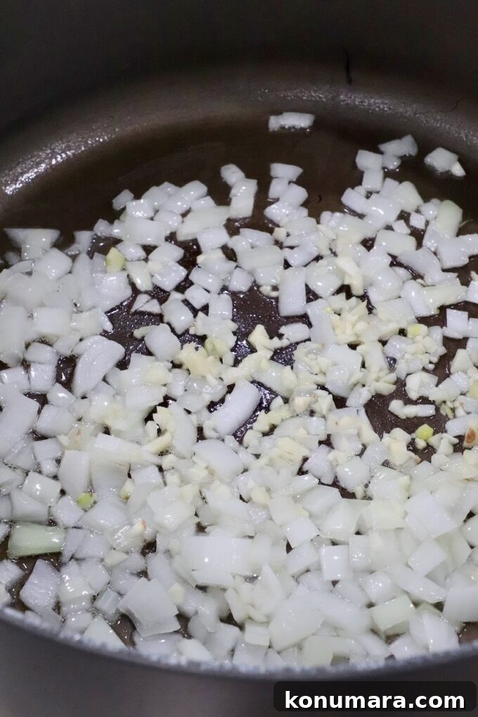 diced onions and minced garlic in large pan