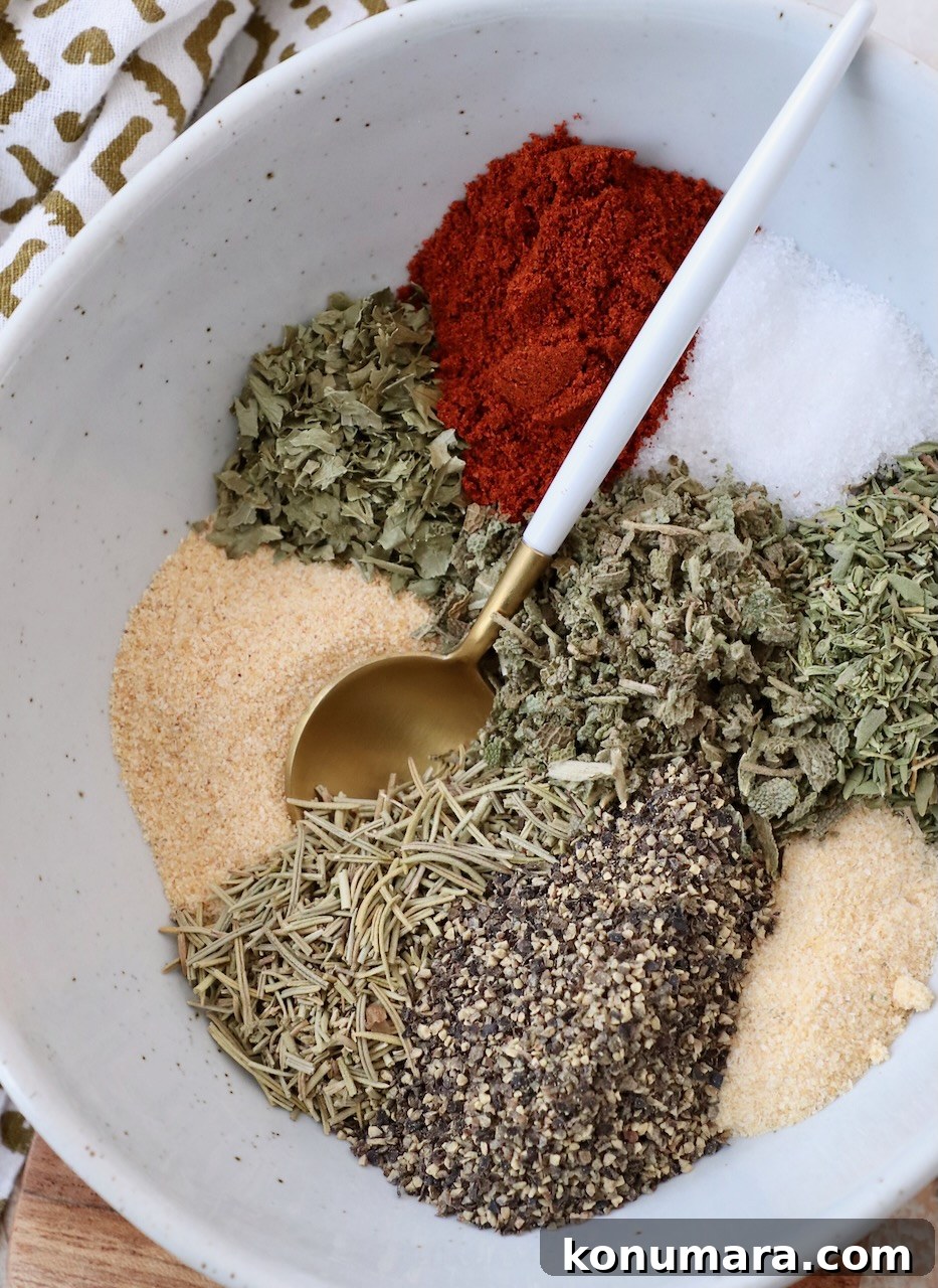 herbs and spices separated in bowl with spoon