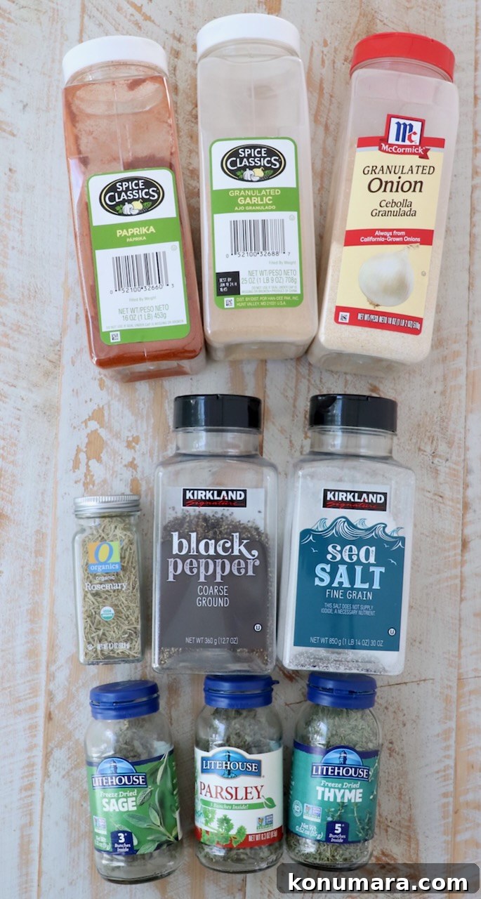 ingredients for turkey seasoning on white wood board