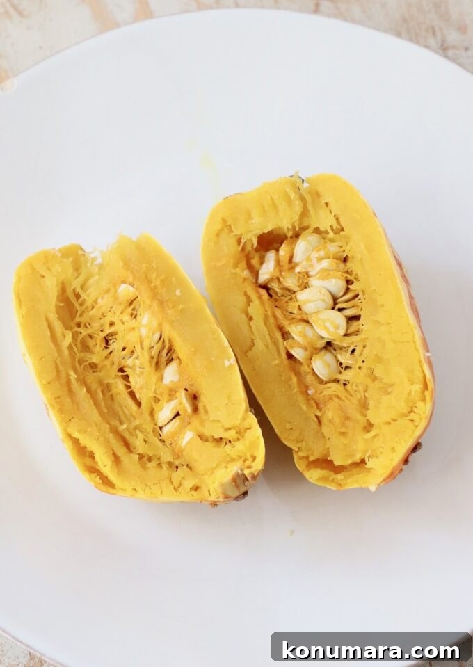 How to Cook Delicata Squash: Roast, Bake and Saute 8 cooked delicata squash cut open on plate
