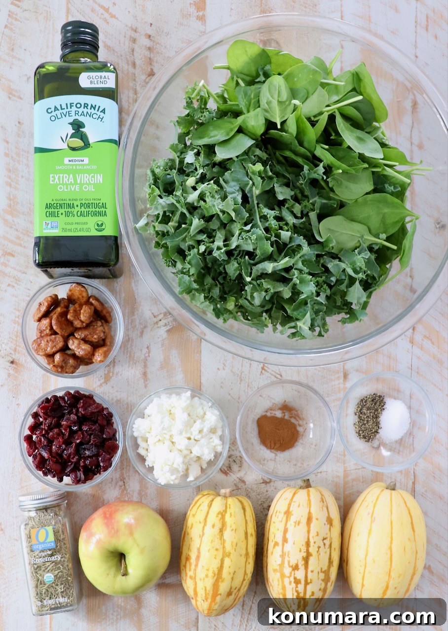 Roasted Delicata Squash Salad with Arugula and Feta 3 ingredients for delicata squash salad on white wood board