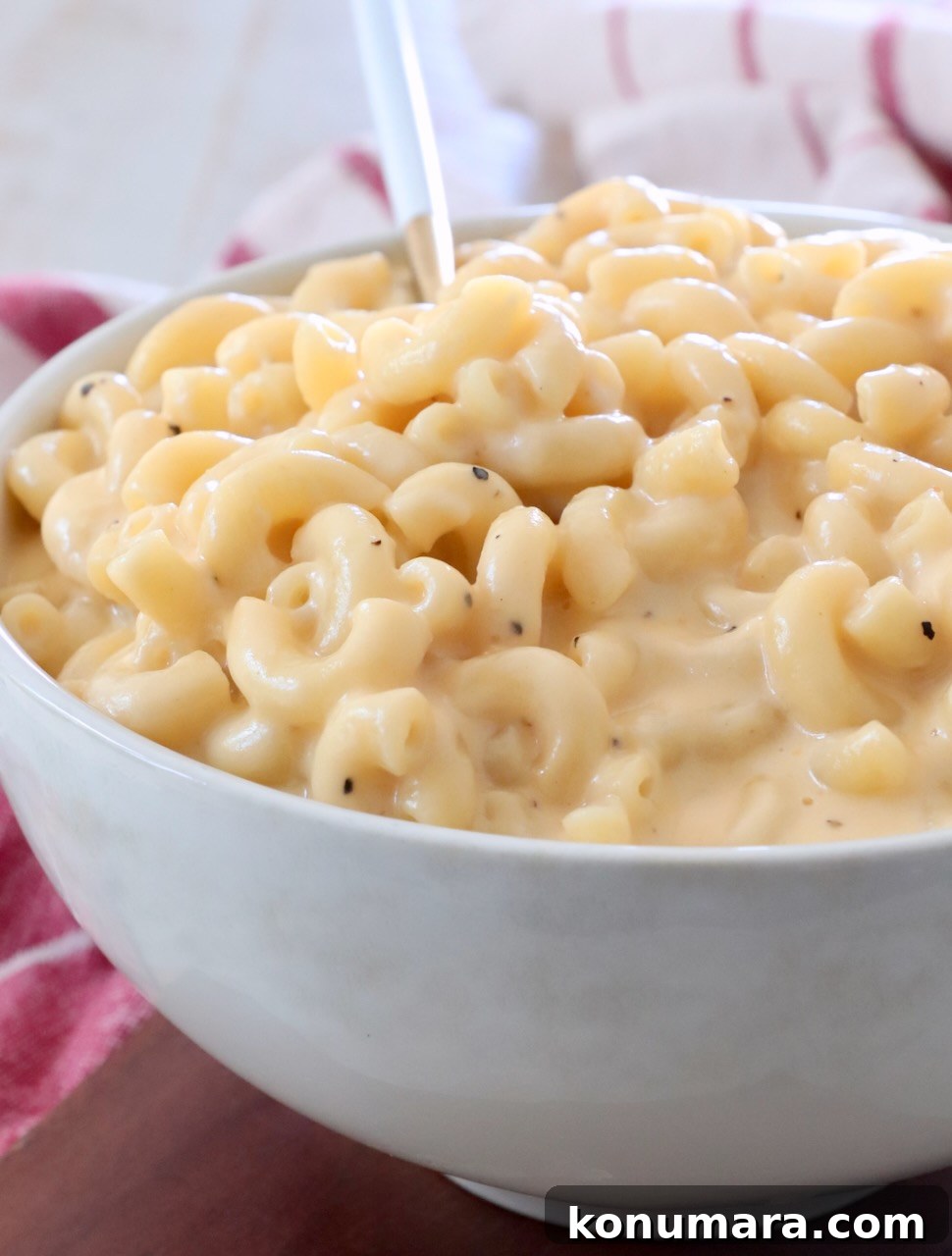 Creamy Homemade Mac and Cheese Recipe 8 macaroni and cheese in bowl with fork